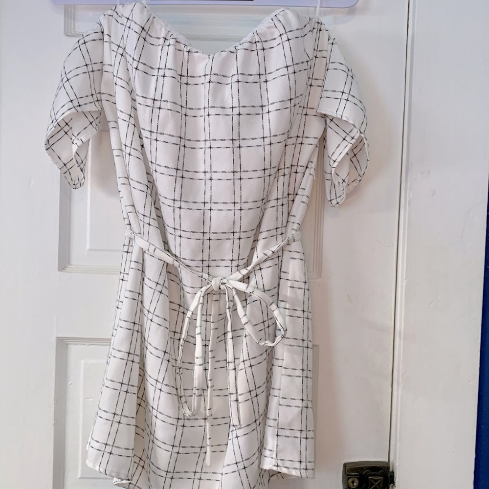 White off the shoulder dress with belt tie in front